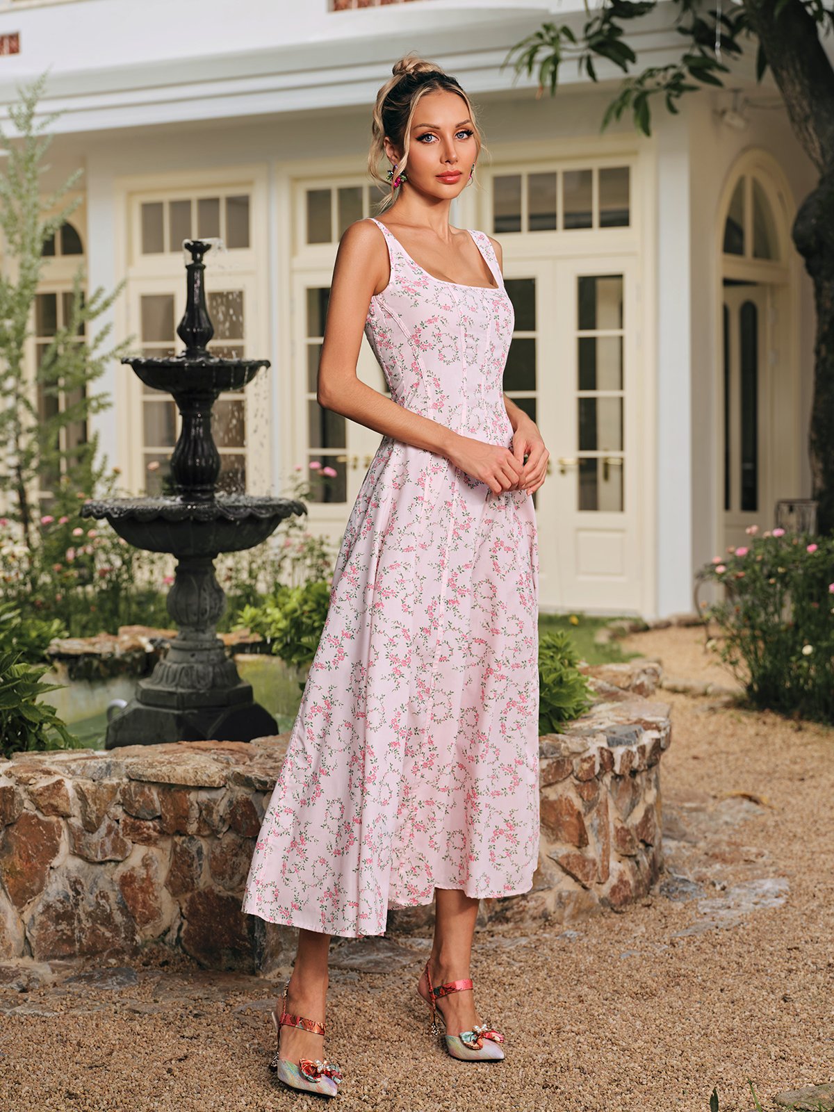 Caelyr Sleeveless Floral Printed Midi Dress