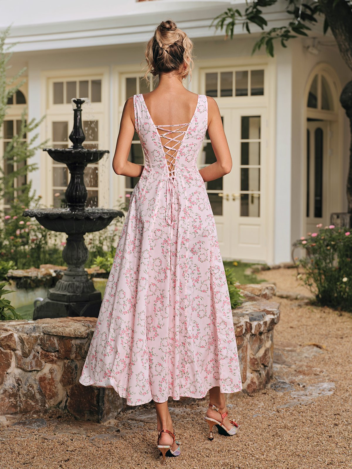 Caelyr Sleeveless Floral Printed Midi Dress