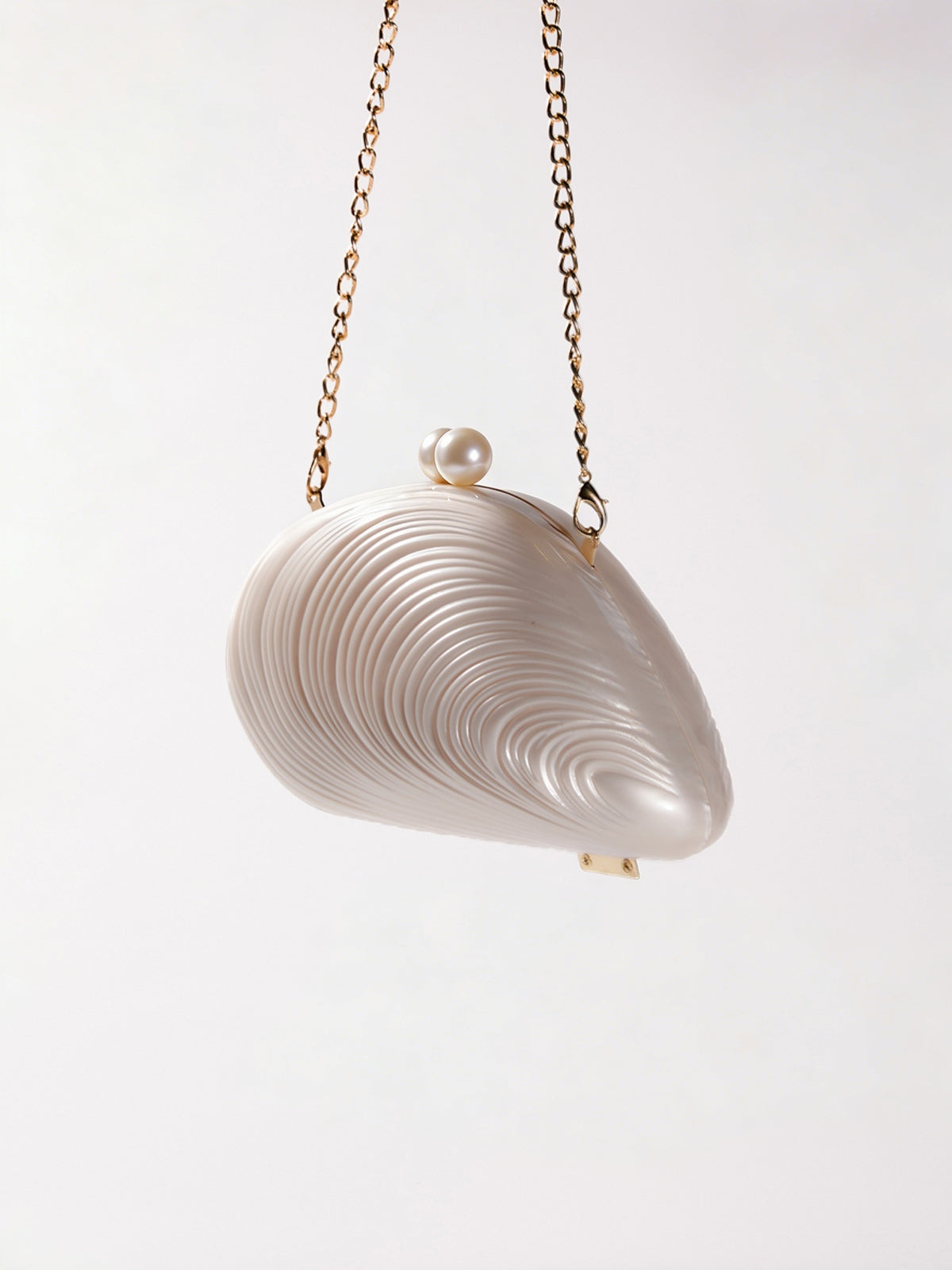 Mahin Seashell Convertible Clutch