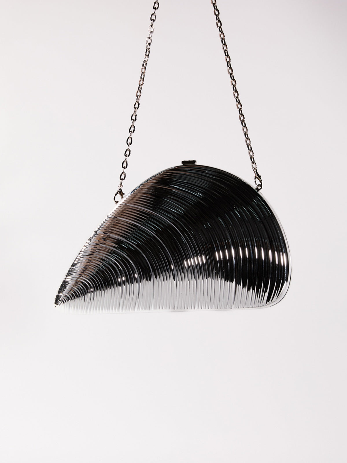 Maika Seashell Convertible Clutch In Silver
